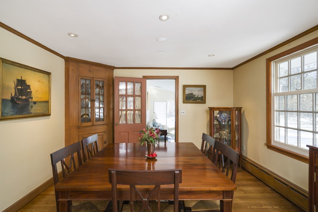62 Rust Way Cohasset, MA 02025 - Photo 7 of 17 a view of a dining room with furniture window and wooden floor