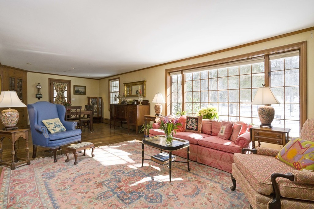 62 Rust Way Cohasset, MA 02025 - Photo 8 of 17 a living room with furniture and a large window