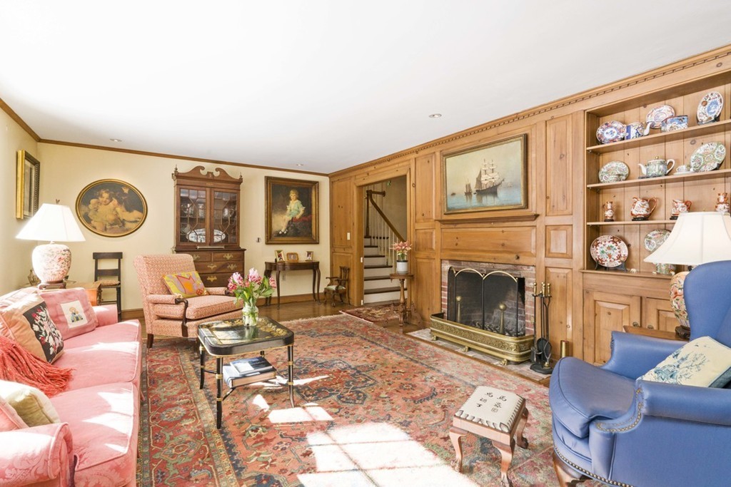 62 Rust Way Cohasset, MA 02025 - Photo 9 of 17 a living room with furniture a window and a fireplace