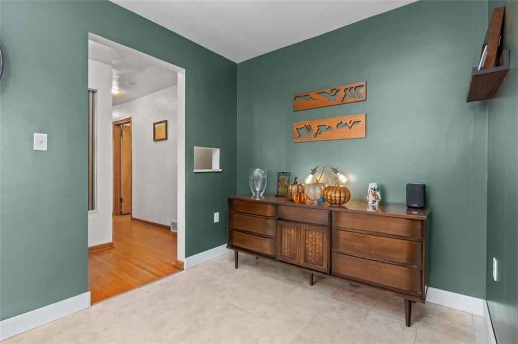 357 Churchill Road Pittsburgh, PA 15235 - Photo 12 of 28 a room with furniture and mirror