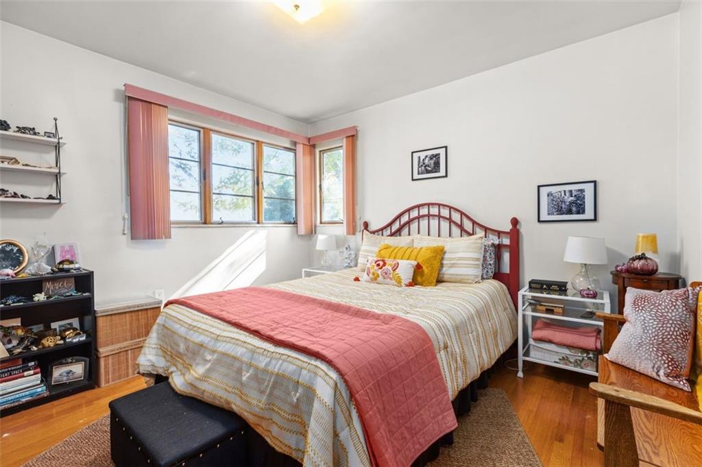 357 Churchill Road Pittsburgh, PA 15235 - Photo 13 of 28 a bedroom with a bed and a couch