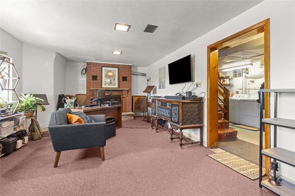 357 Churchill Road Pittsburgh, PA 15235 - Photo 24 of 28 a living room with furniture and a flat screen tv