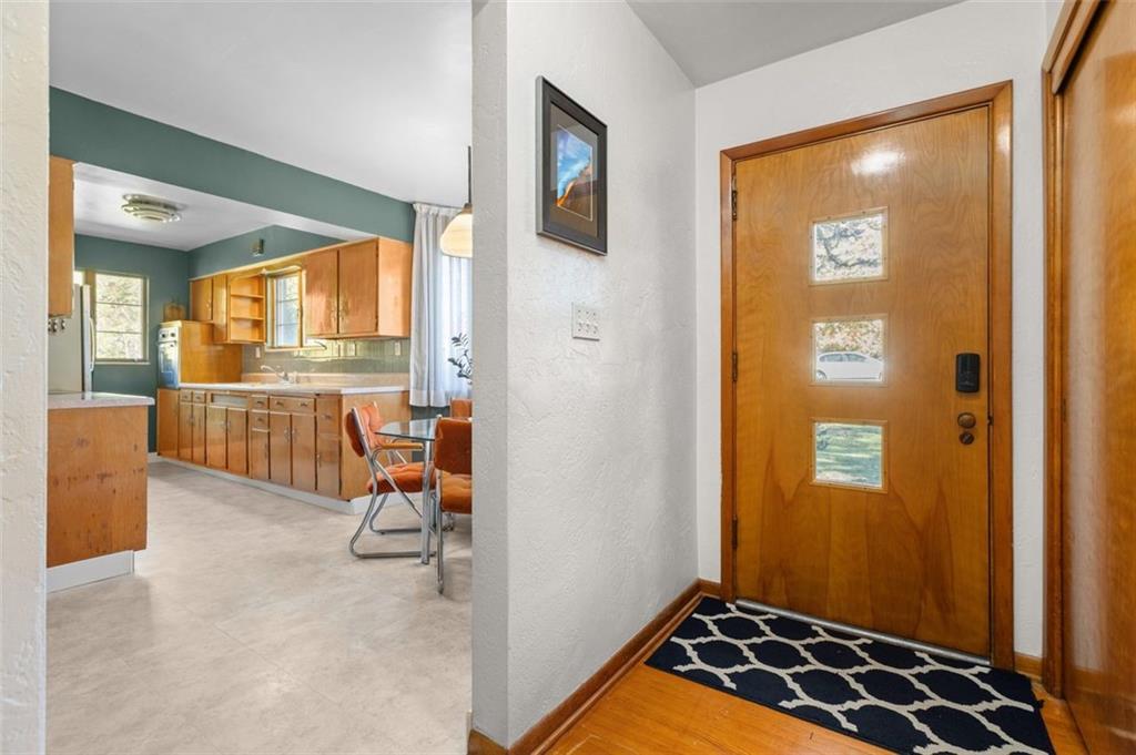 357 Churchill Road Pittsburgh, PA 15235 - Photo 3 of 28 a view of a hallway with workspace and windows