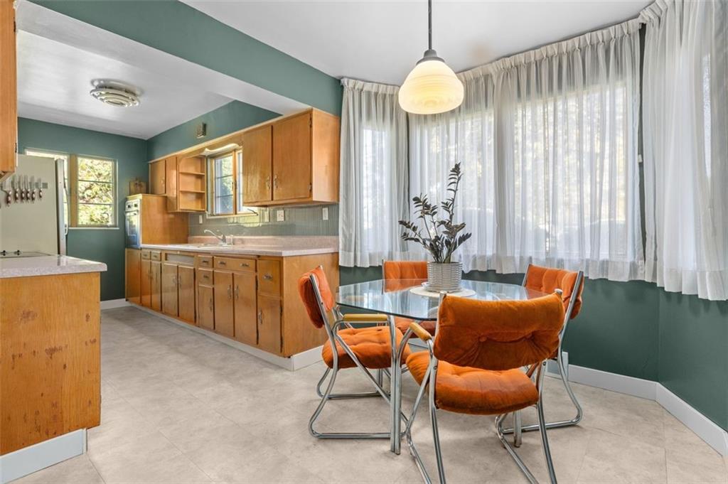 357 Churchill Road Pittsburgh, PA 15235 - Photo 7 of 28 a view of a dining room with furniture window and outside view