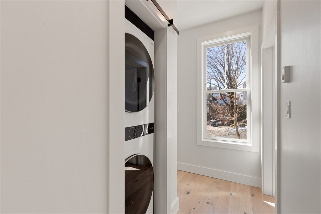 656 Mystic Avenue, Unit B Somerville, MA 02145 - Photo 18 of 40 a view of entry way with wooden floor