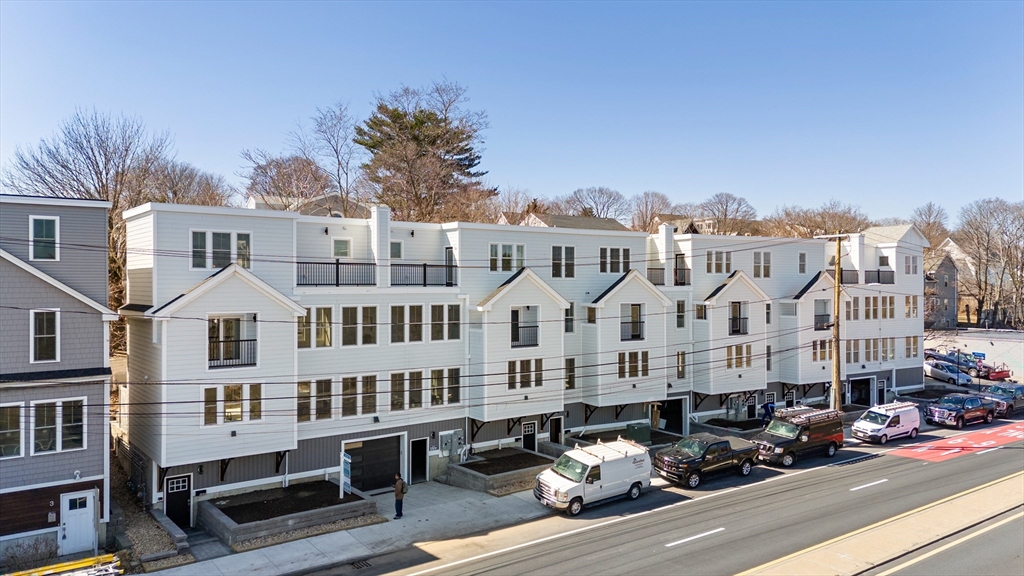 656 Mystic Avenue, Unit B Somerville, MA 02145 - Photo 35 of 40 a front view of a building with street view