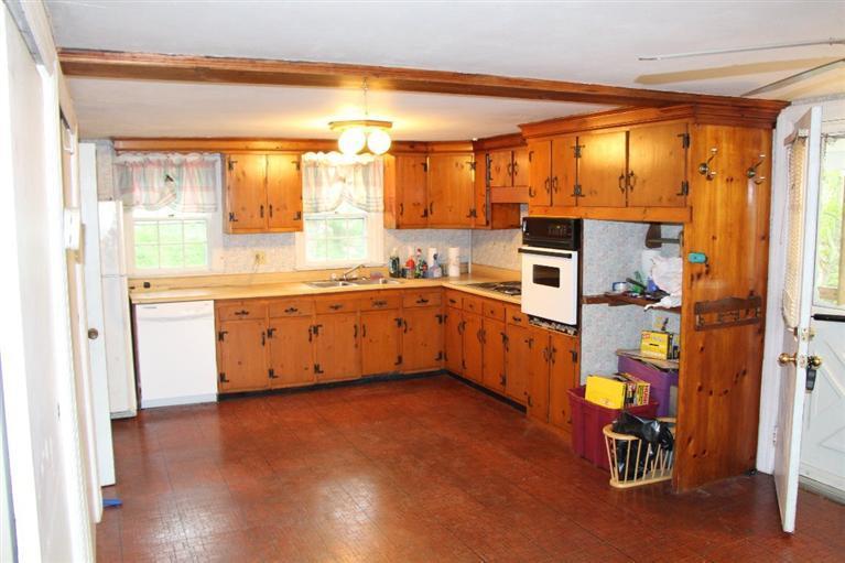 1 Cross Road Bourne, MA 02532 - Photo 11 of 22 a kitchen with a sink cabinets and window