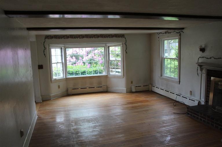 1 Cross Road Bourne, MA 02532 - Photo 12 of 22 a view of wooden floor and windows in a room