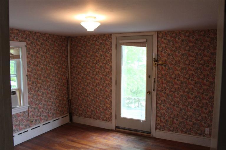 1 Cross Road Bourne, MA 02532 - Photo 16 of 22 a view of an empty room with wooden floor and a window