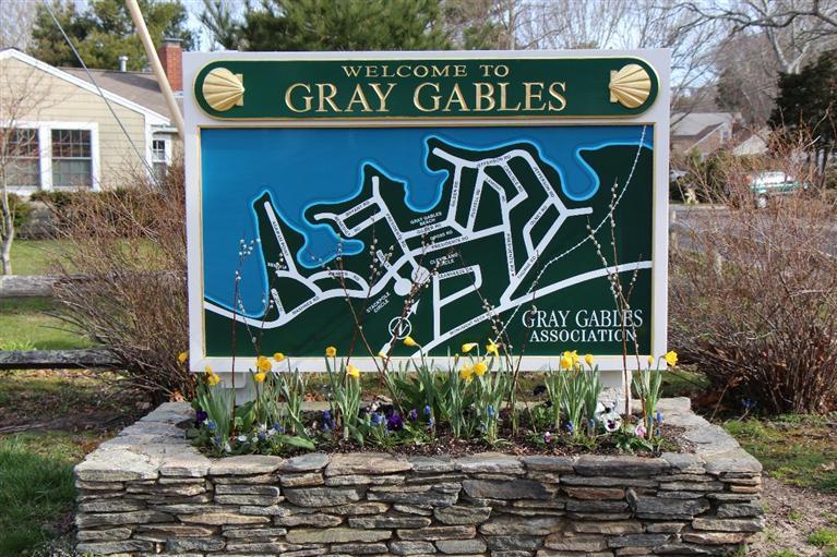 1 Cross Road Bourne, MA 02532 - Photo 21 of 22 a street sign that is on a pole