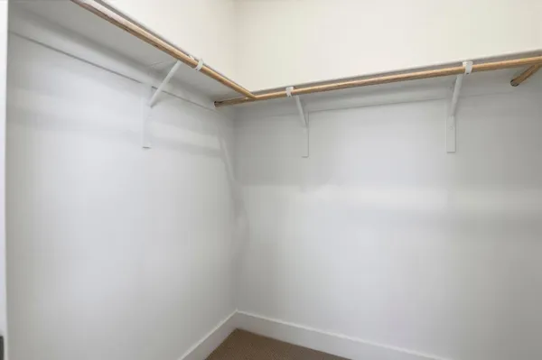a view of bathroom with a sink and a toilet