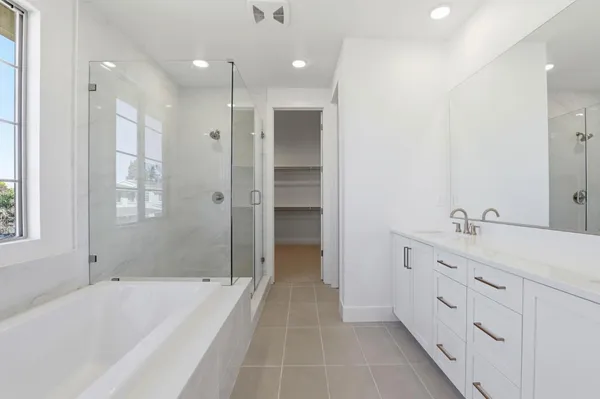 a white toilet sitting in a bathroom