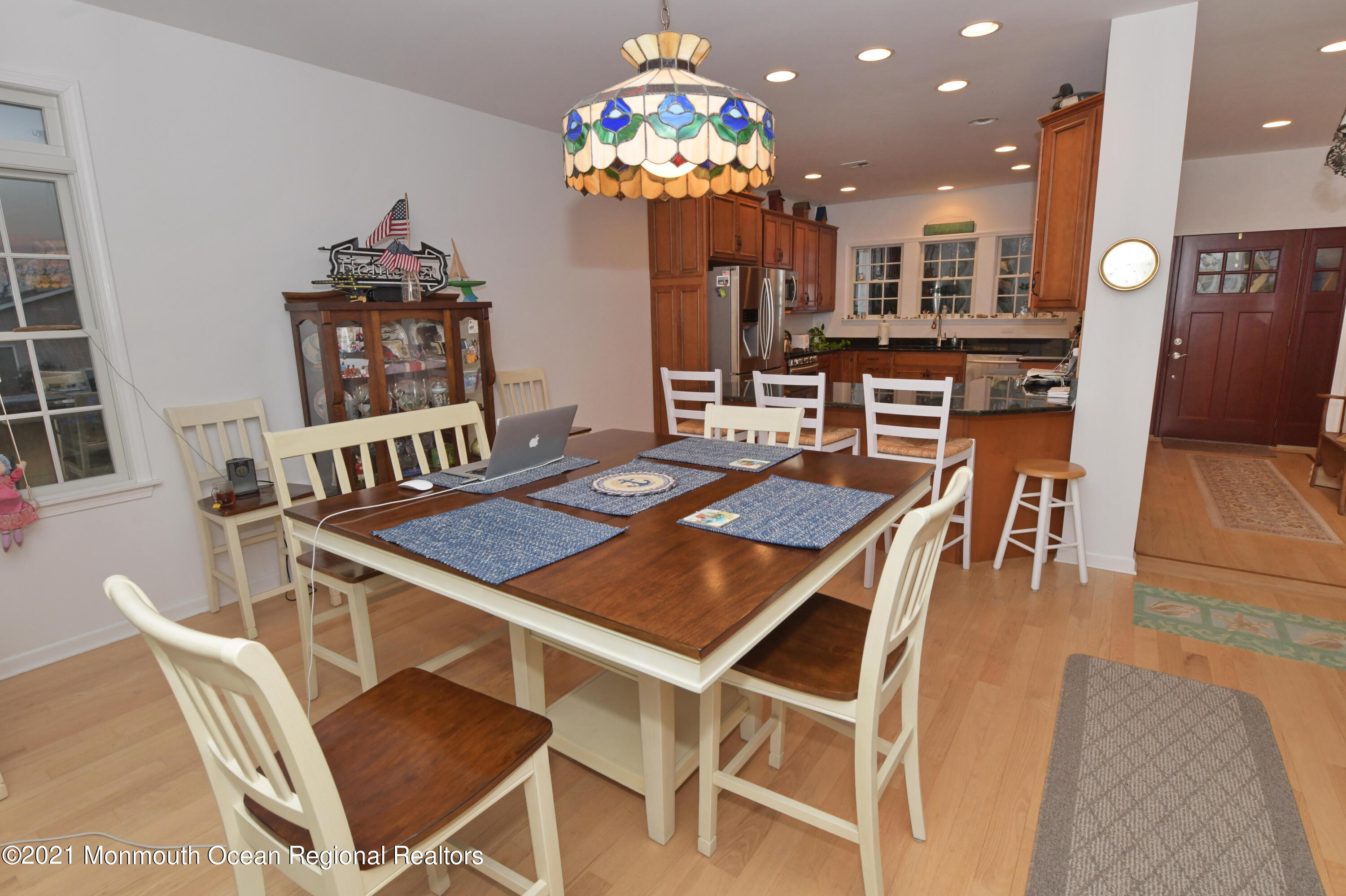 64 Seagoin Road Brick, NJ 08723 - Photo 14 of 48 a view of a dining room with furniture and chandelier
