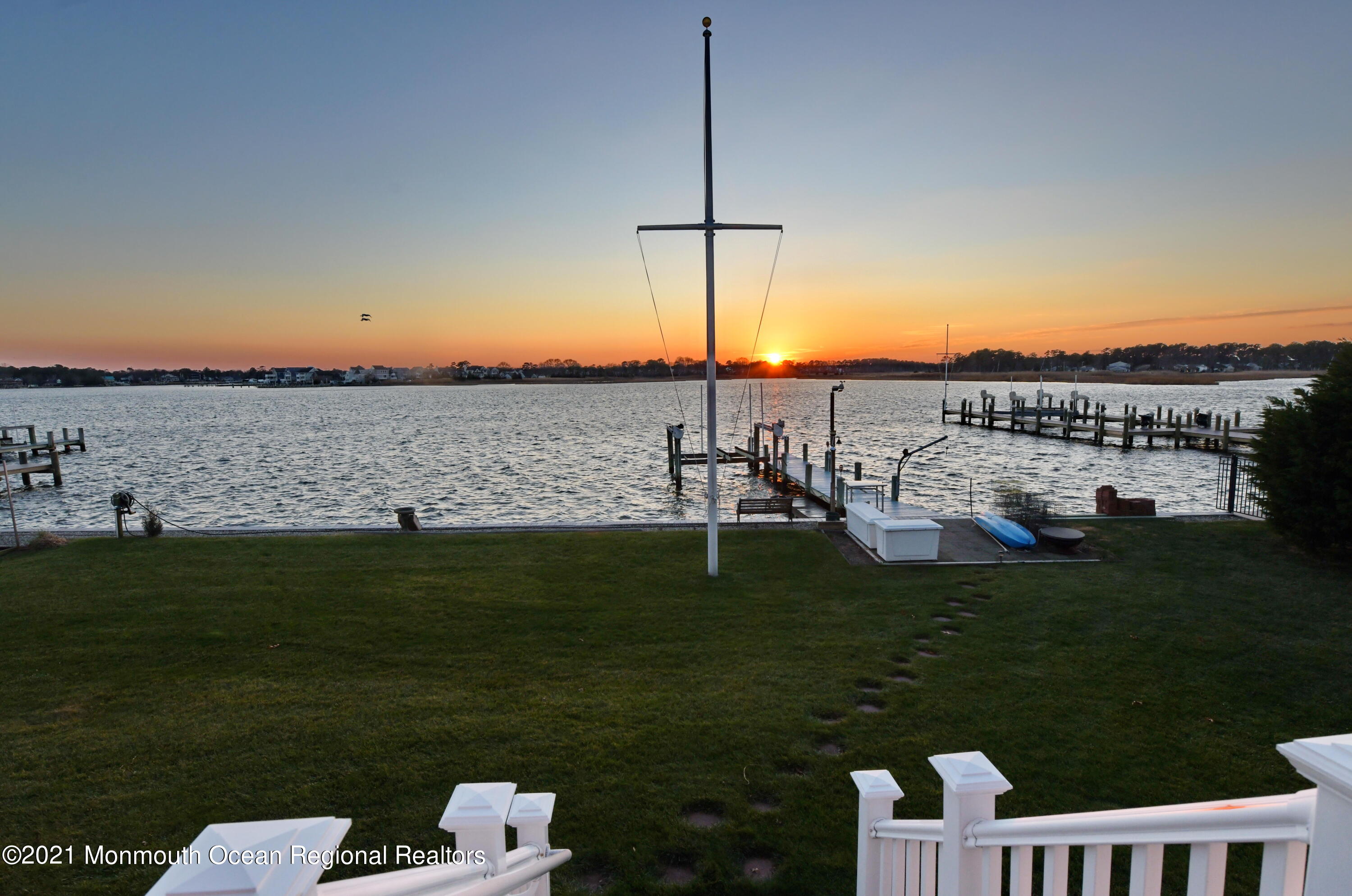 64 Seagoin Road Brick, NJ 08723 - Photo 3 of 48 a view of a lake with a big yard