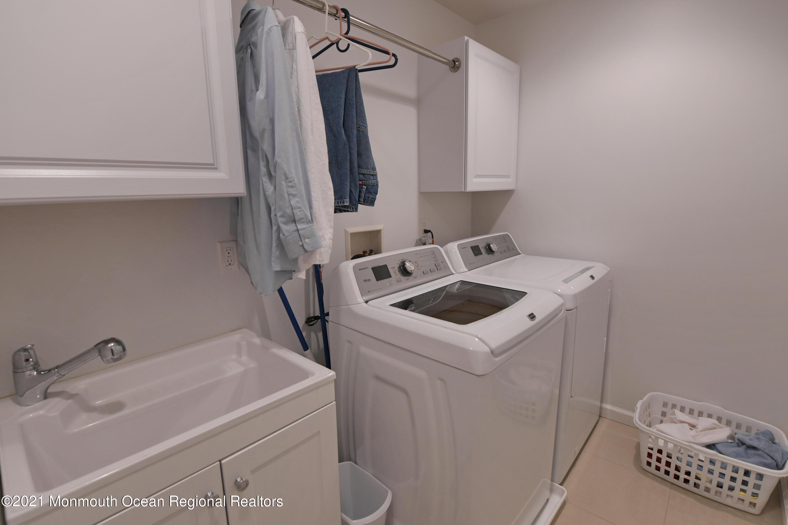 64 Seagoin Road Brick, NJ 08723 - Photo 22 of 48 a utility room with dryer and washer