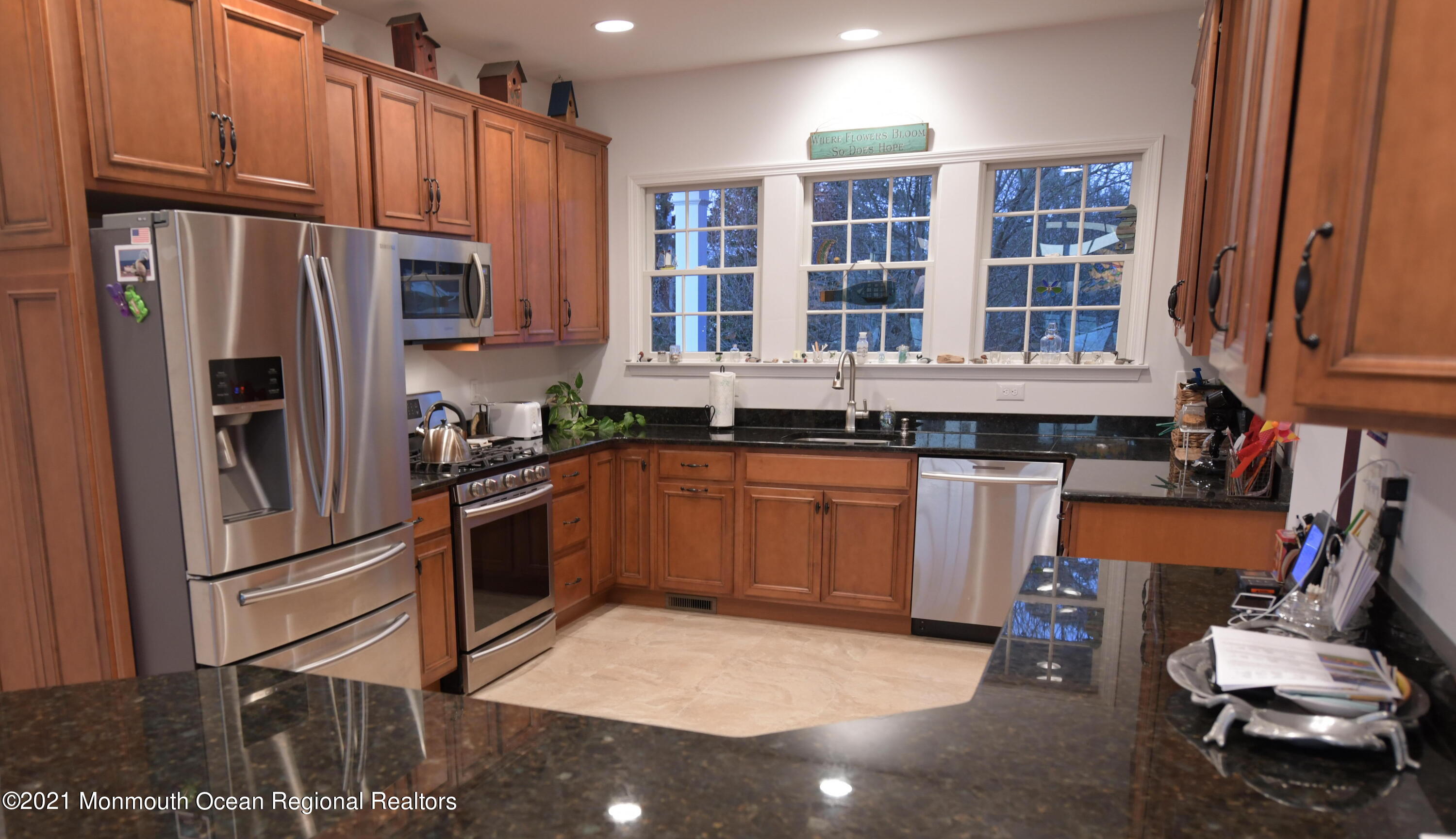 64 Seagoin Road Brick, NJ 08723 - Photo 9 of 48 a kitchen with granite countertop a refrigerator stove top oven and sink