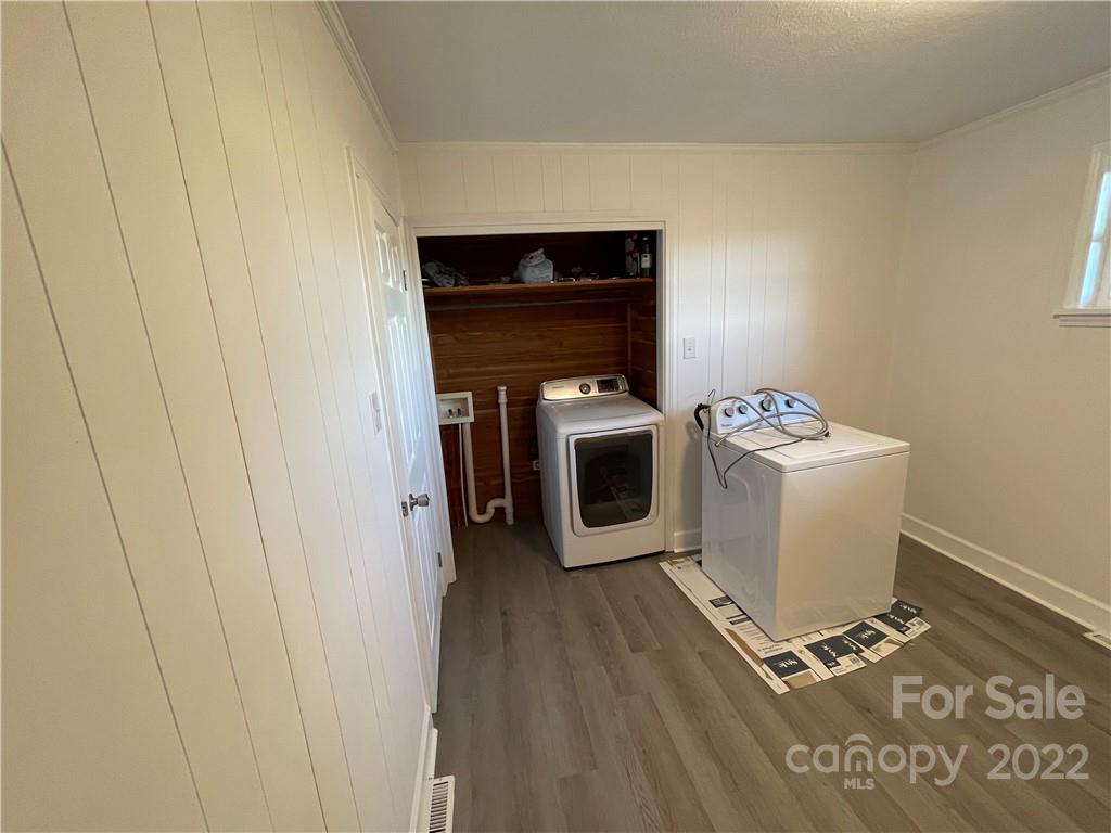 3180 Foster Road Cleveland, NC 27013 - Photo 13 of 16 a utility room with washer and dryer