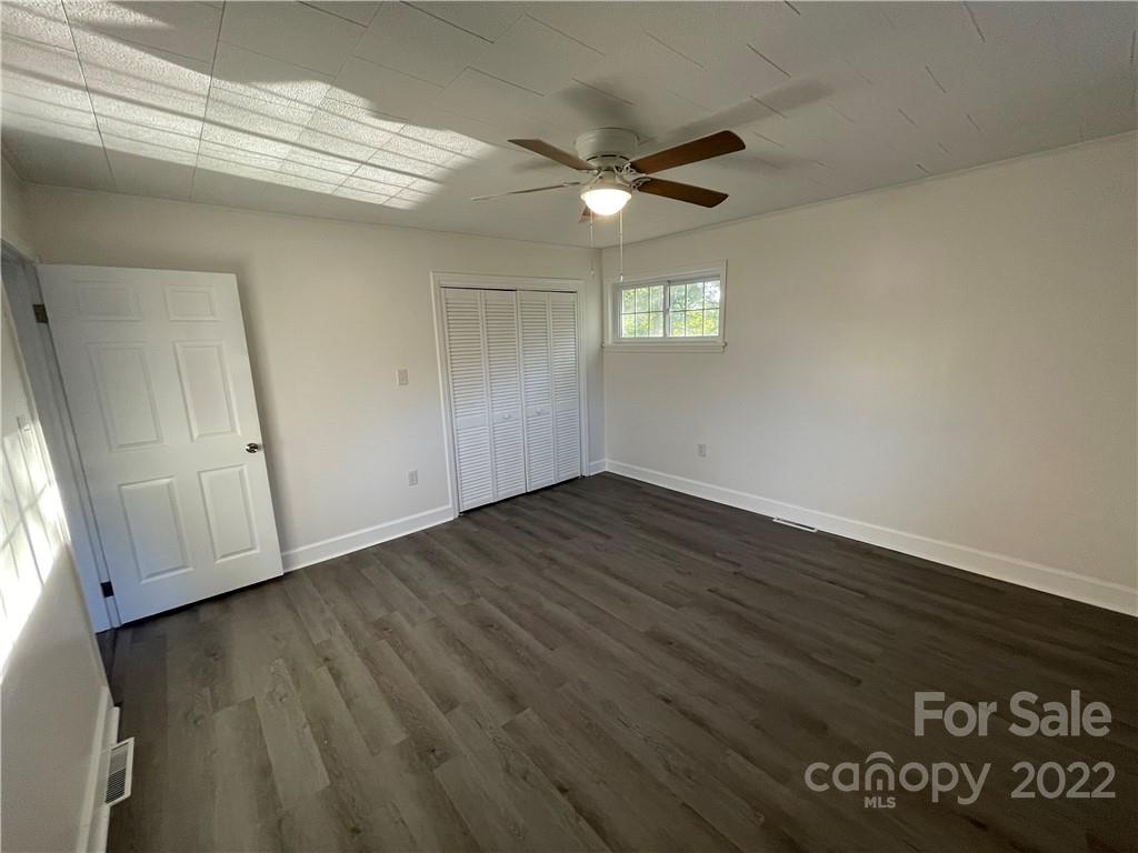 3180 Foster Road Cleveland, NC 27013 - Photo 8 of 16 wooden floor in an empty room
