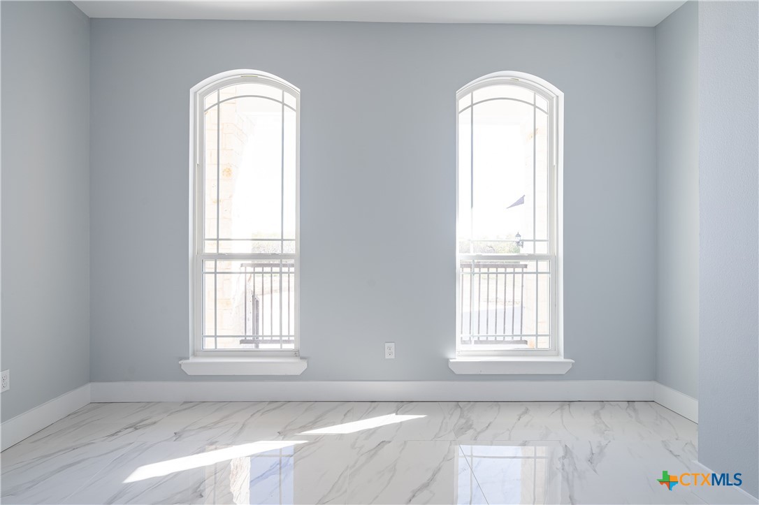 1000 Black Ankle Road Lockhart, TX 78644 - Photo 20 of 40 an empty room with windows