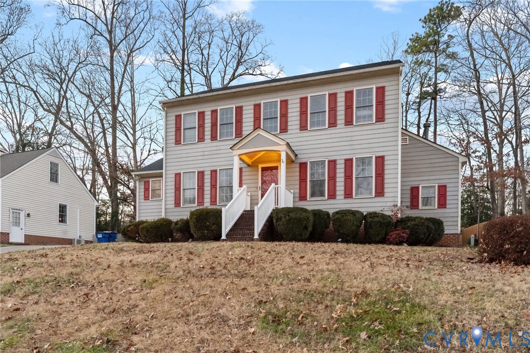 10204 Stonecrest Road Chesterfield, VA 23236 - Photo 2 of 36 a front view of a house with a yard