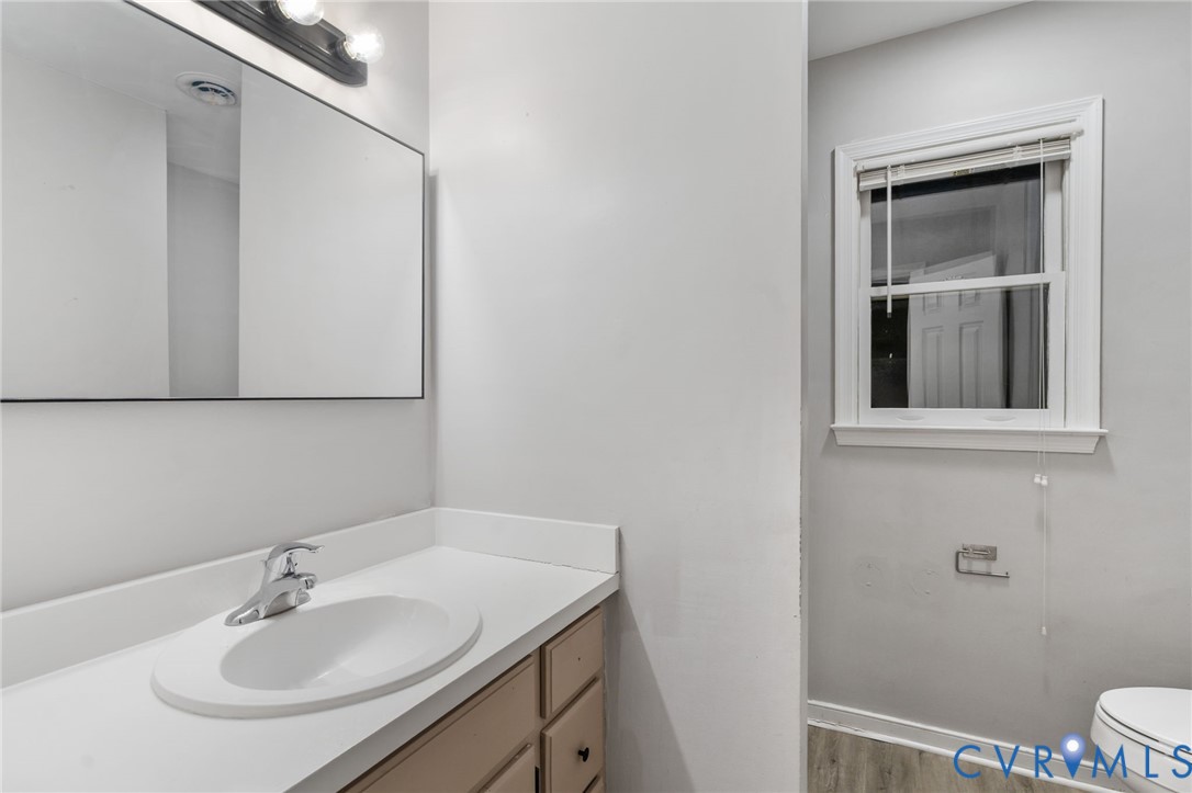 10204 Stonecrest Road Chesterfield, VA 23236 - Photo 27 of 36 a bathroom with a sink and a toilet