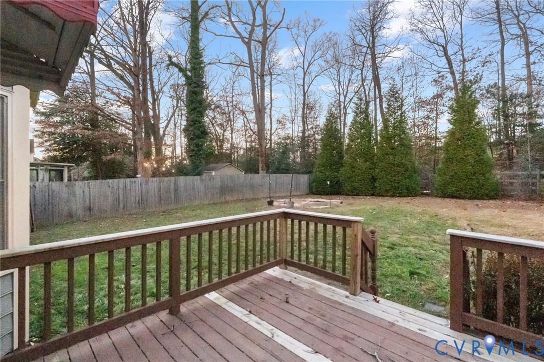 10204 Stonecrest Road Chesterfield, VA 23236 - Photo 35 of 36 a view of deck with trees and wooden fence
