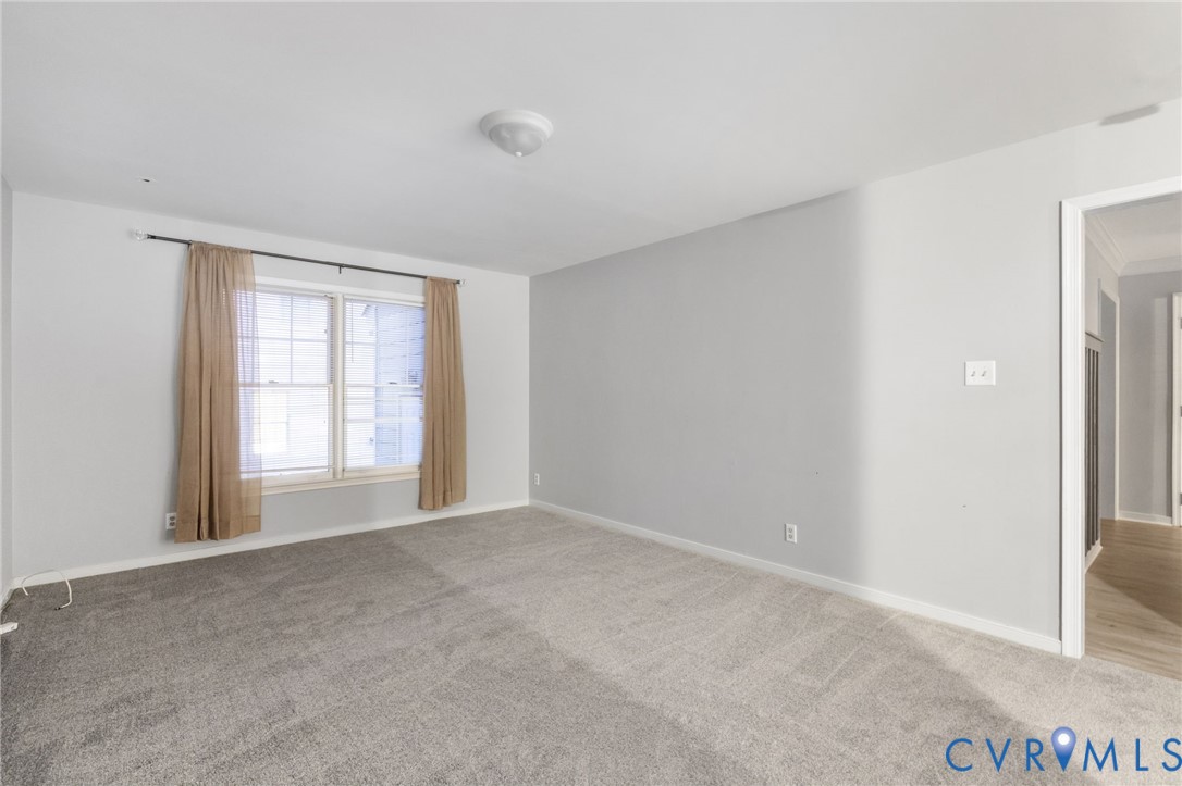 10204 Stonecrest Road Chesterfield, VA 23236 - Photo 8 of 36 a view of an empty room with a window