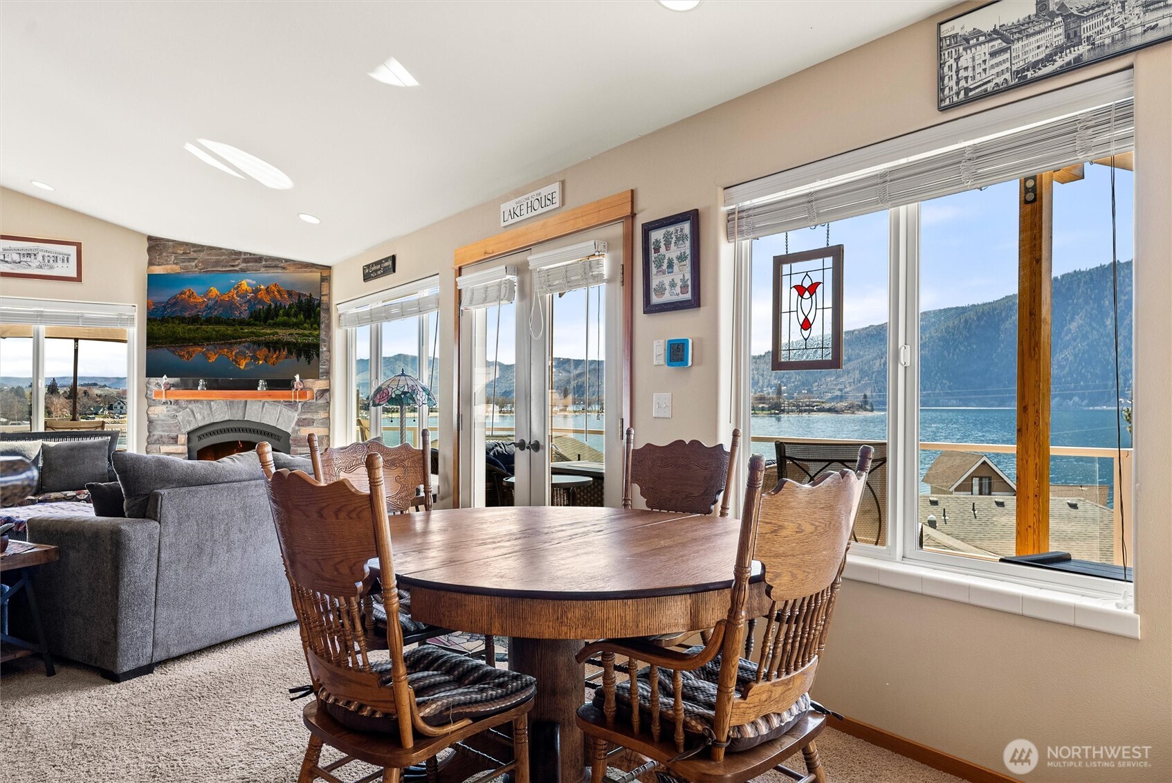 563 Topaz Place Manson, WA 98831 - Photo 16 of 38 a view of a dining room with furniture window and outside view