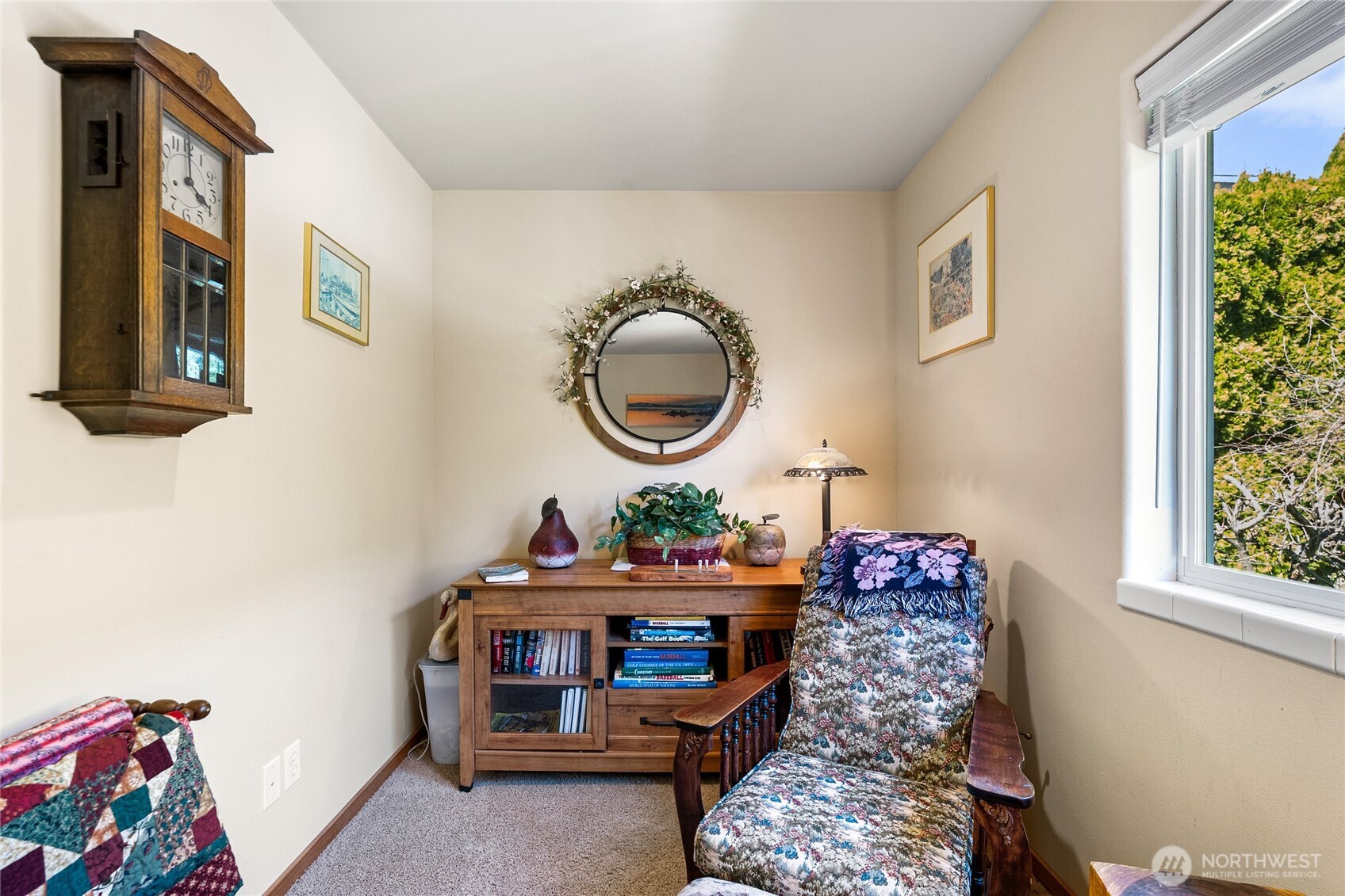 563 Topaz Place Manson, WA 98831 - Photo 23 of 38 a living room with furniture and a chair