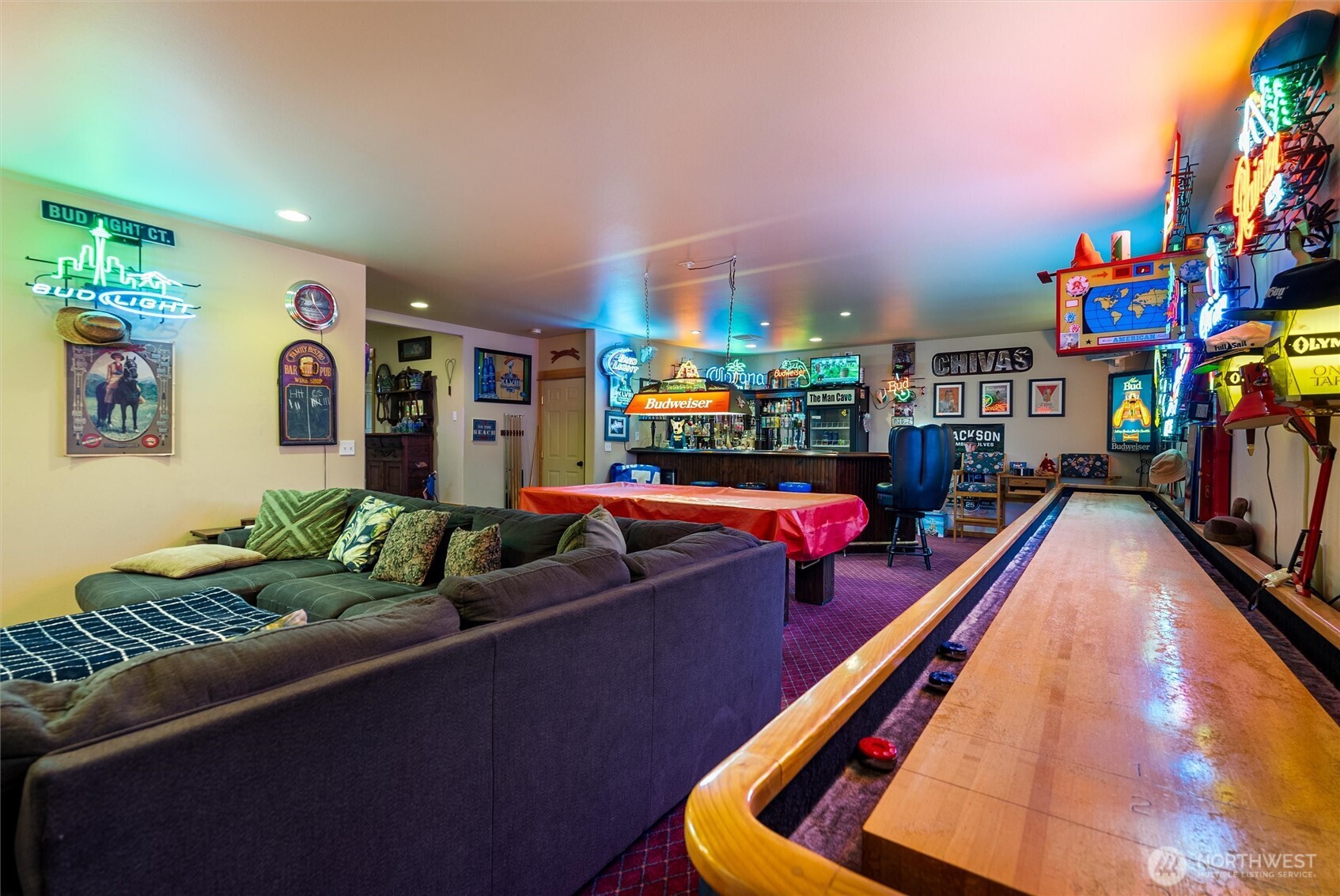 563 Topaz Place Manson, WA 98831 - Photo 27 of 38 a living room with furniture pool and flat screen tv