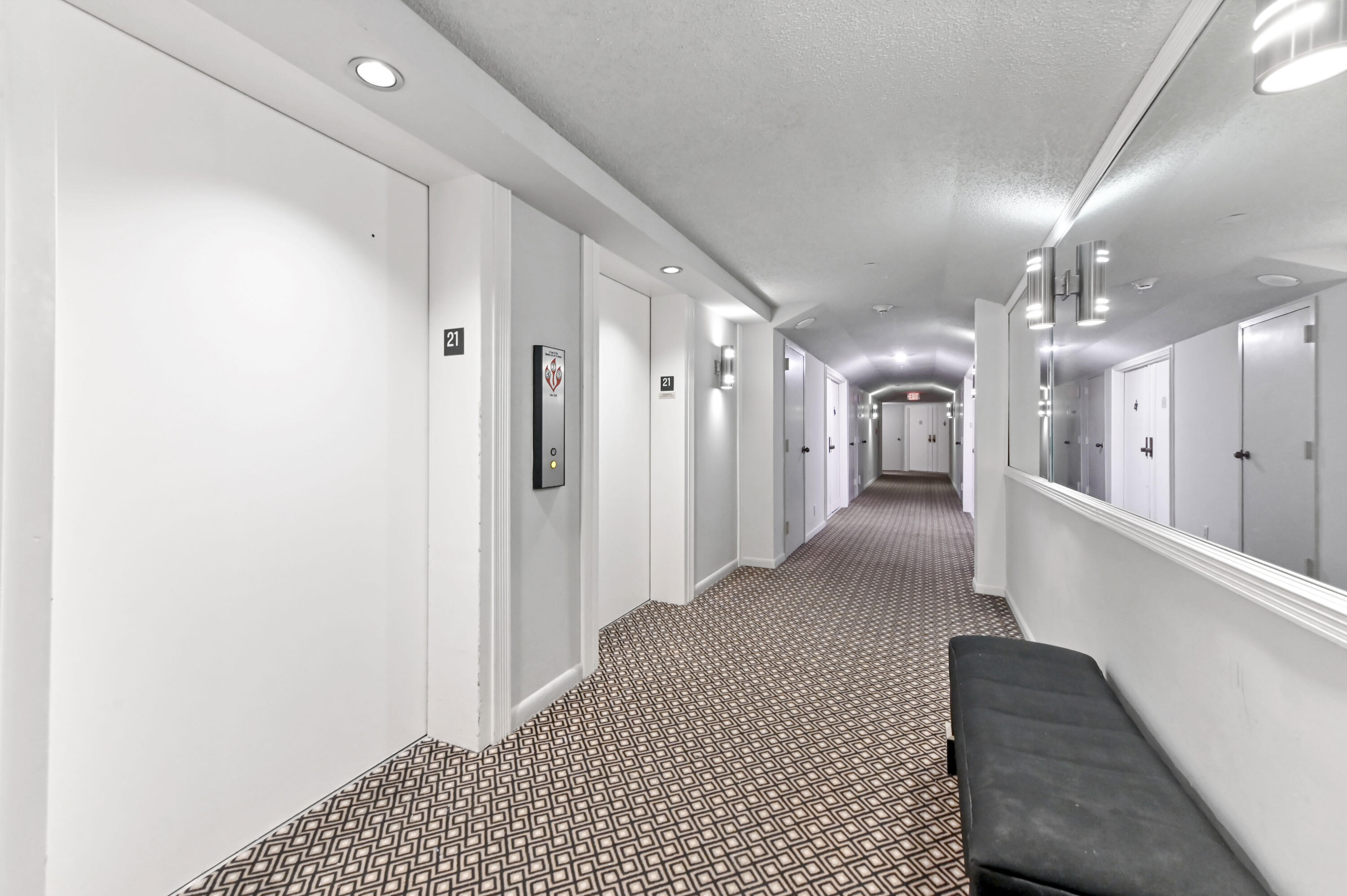 1900 Consulate Place, Unit 2104 West Palm Beach, FL 33401 - Photo 2 of 72 a view of a hallway with a couch