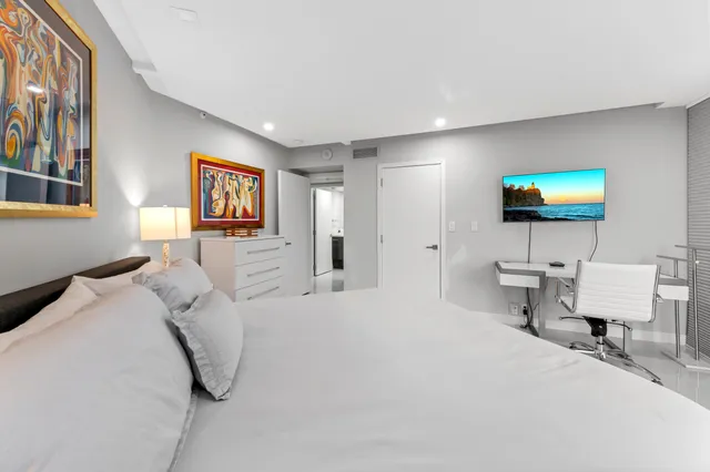 a view of a living room and kitchen