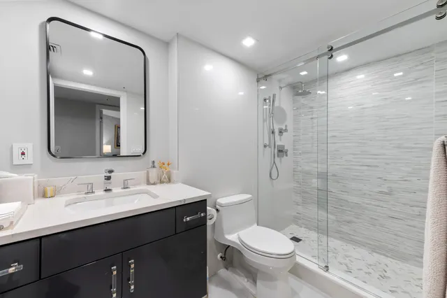 a outdoor space with patio the couches and a potted plant on a table