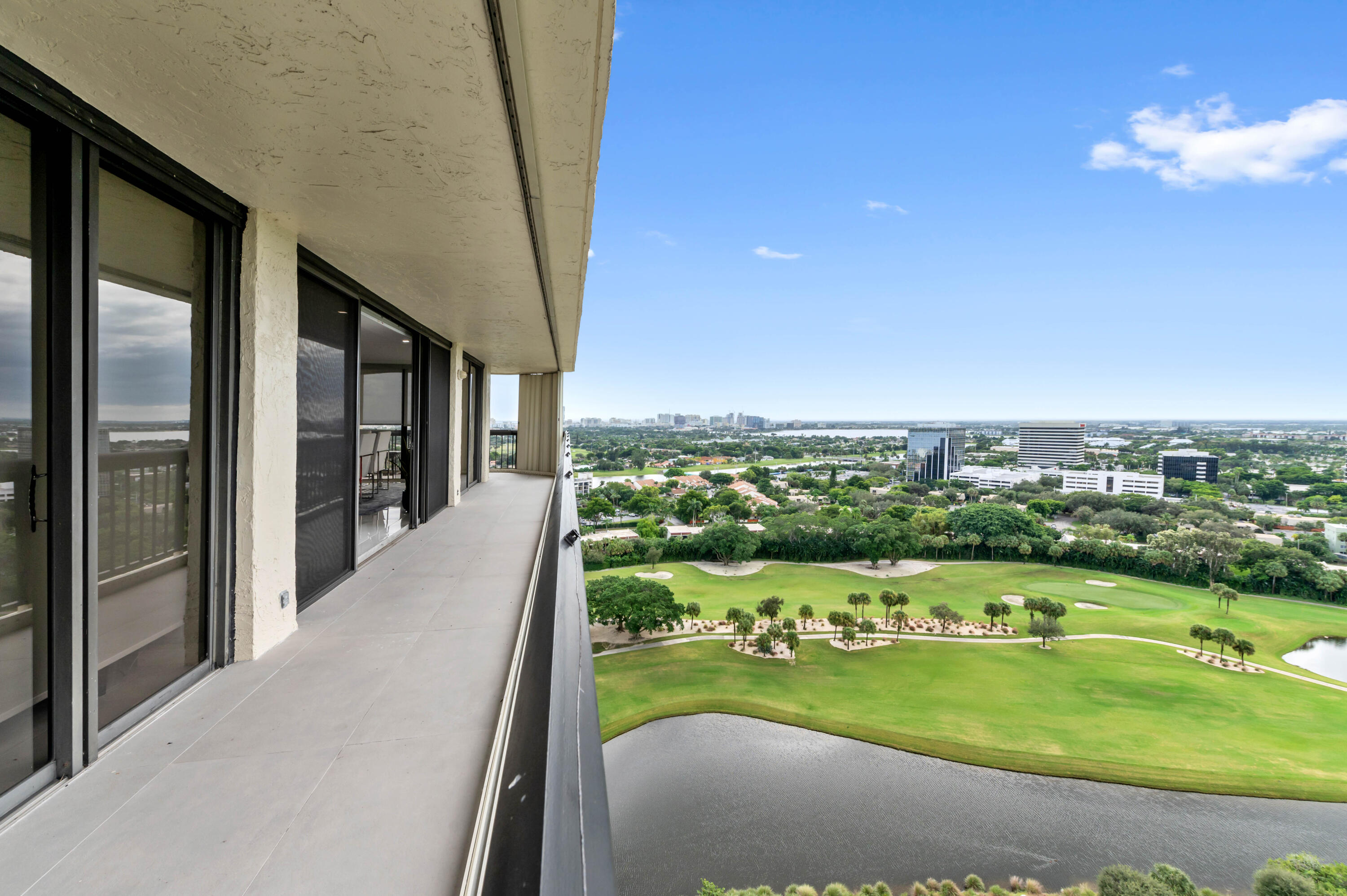 1900 Consulate Place, Unit 2104 West Palm Beach, FL 33401 - Photo 31 of 72 a view of a balcony with an outdoor space