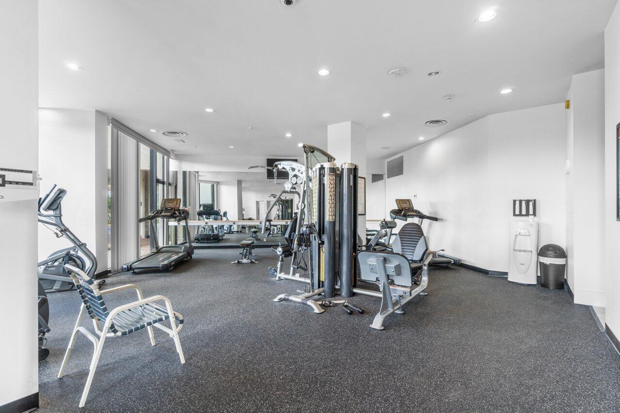 1900 Consulate Place, Unit 2104 West Palm Beach, FL 33401 - Photo 52 of 72 a view of a room with gym equipment