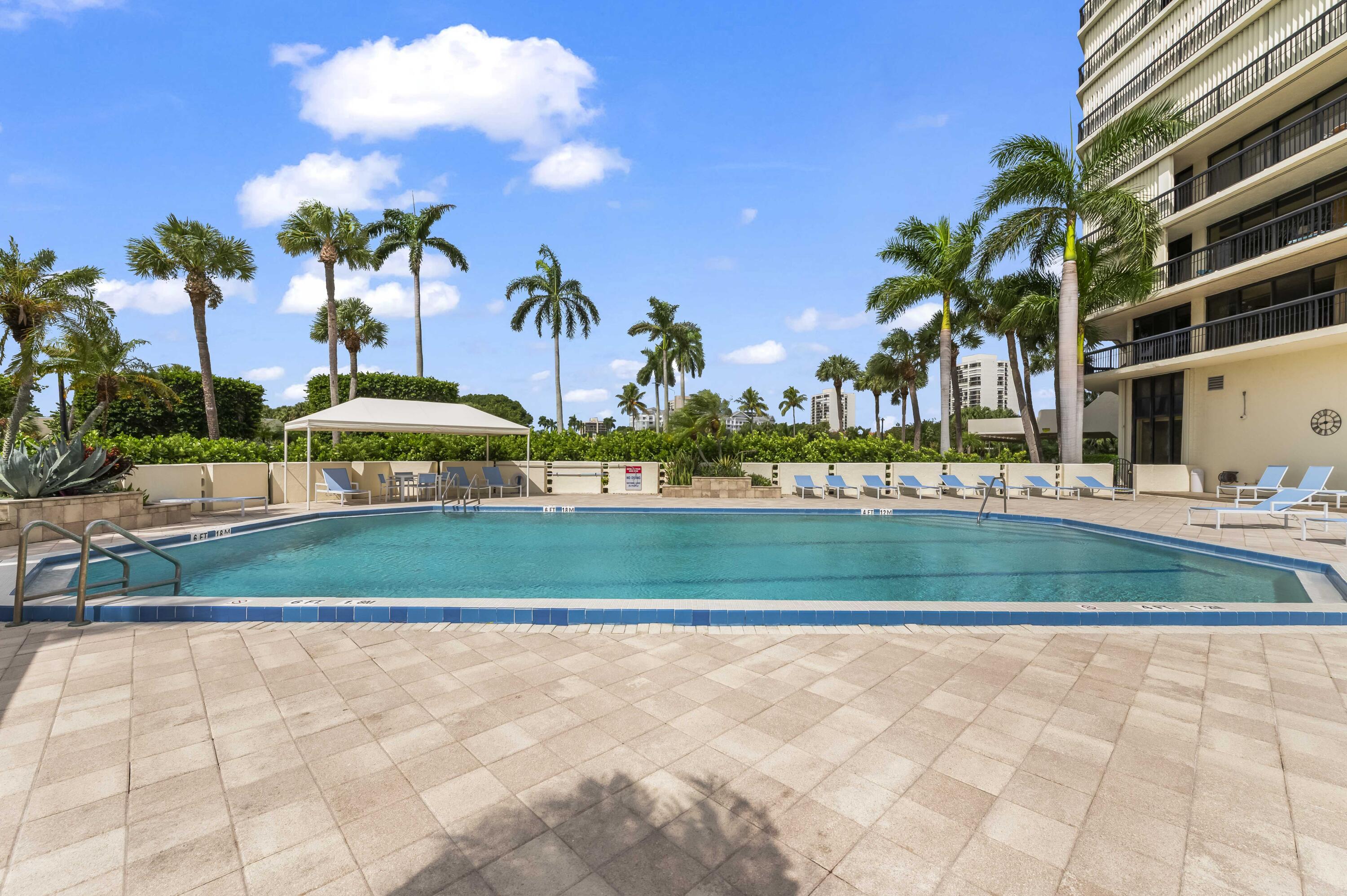 1900 Consulate Place, Unit 2104 West Palm Beach, FL 33401 - Photo 56 of 72 a view of a yard and entertaining space