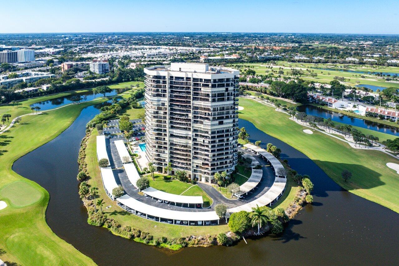 1900 Consulate Place, Unit 2104 West Palm Beach, FL 33401 - Photo 68 of 72 a aerial view of a city with lawn chairs
