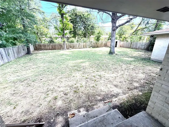 a view of a entrance gate of a house