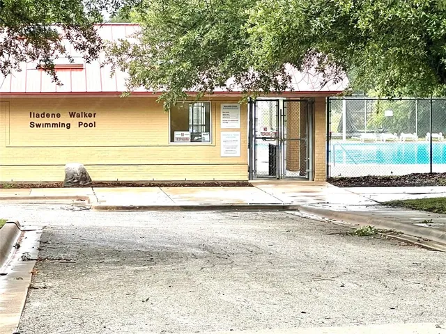 a view of a backyard with a small cabin