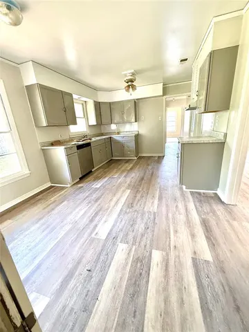 a bathroom with a sink and a bathtub