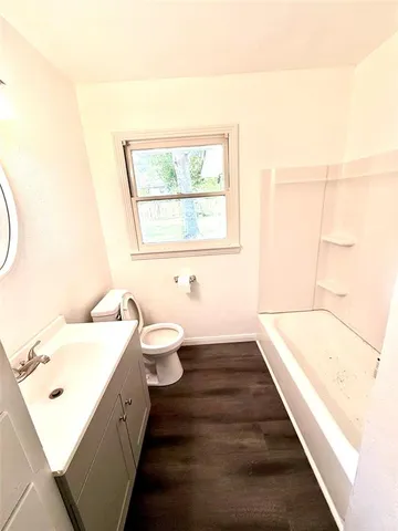 a bathroom with a sink and a toilet