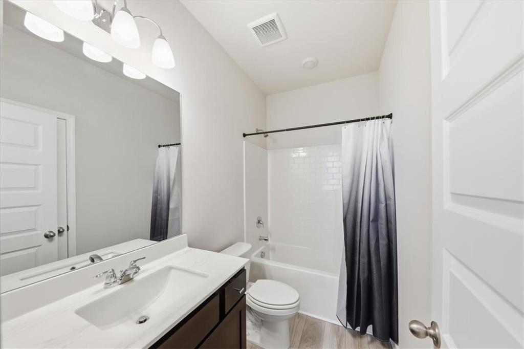 61 Rushing View Glen Dallas, GA 30157 - Photo 11 of 54 a bathroom with a sink a toilet a mirror and shower