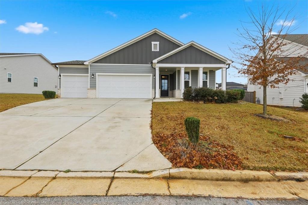 61 Rushing View Glen Dallas, GA 30157 - Photo 2 of 54 a front view of a house with garden