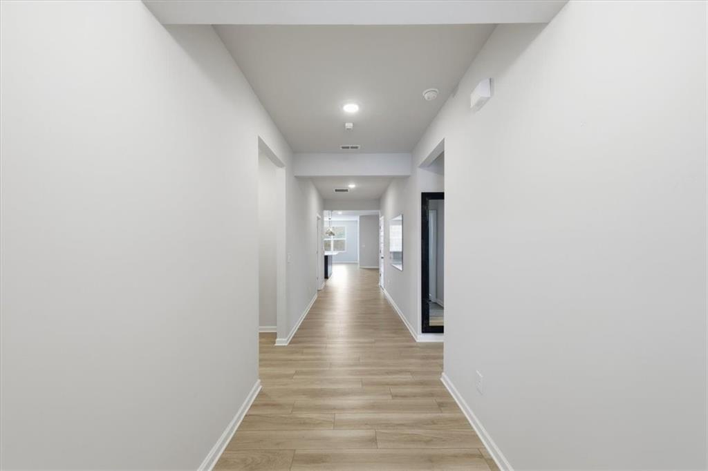 61 Rushing View Glen Dallas, GA 30157 - Photo 8 of 54 a view of a hallway with wooden floor
