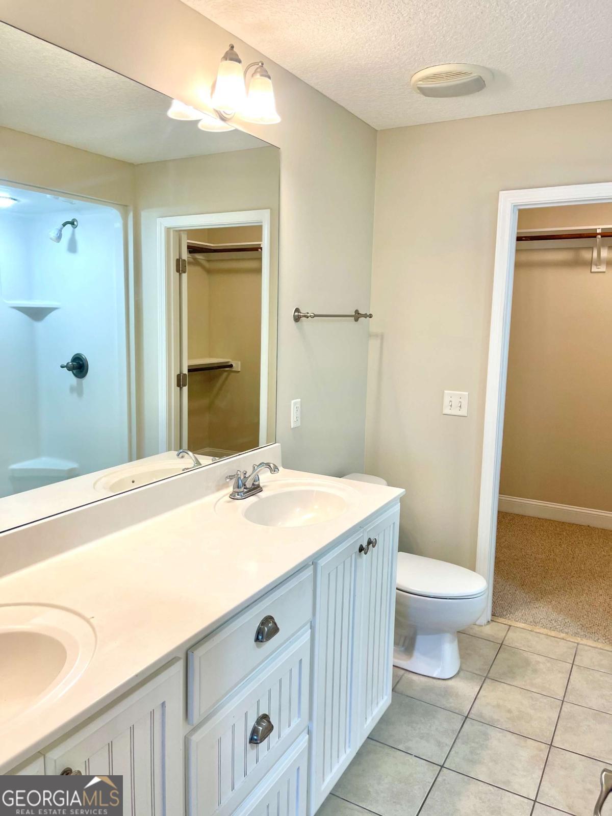 17 Fox Path St. Marys, GA 31558 - Photo 15 of 19 a spacious bathroom with a granite countertop sink toilet and shower