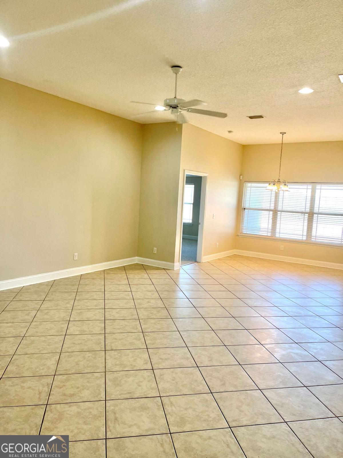 17 Fox Path St. Marys, GA 31558 - Photo 3 of 19 a view of an empty room and window