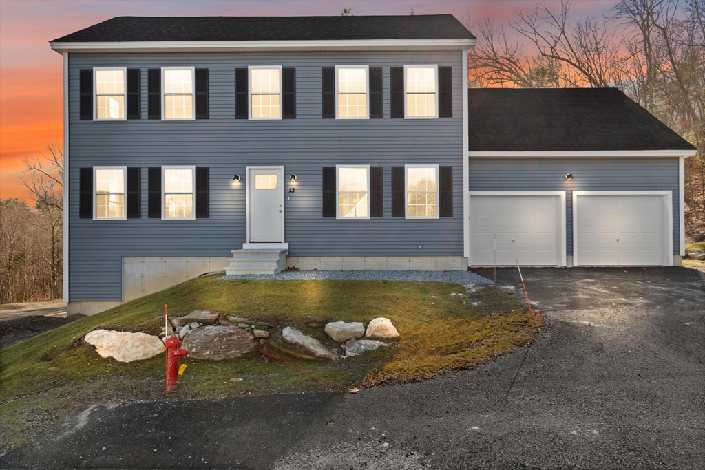 a view of a house with swimming pool