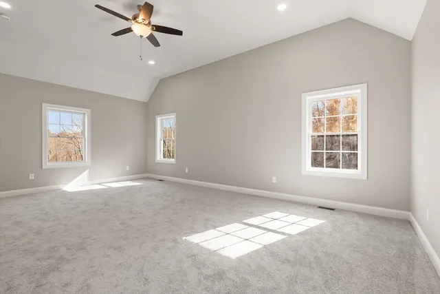 a view of empty room with windows