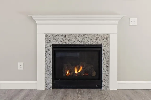 a living room with a fireplace