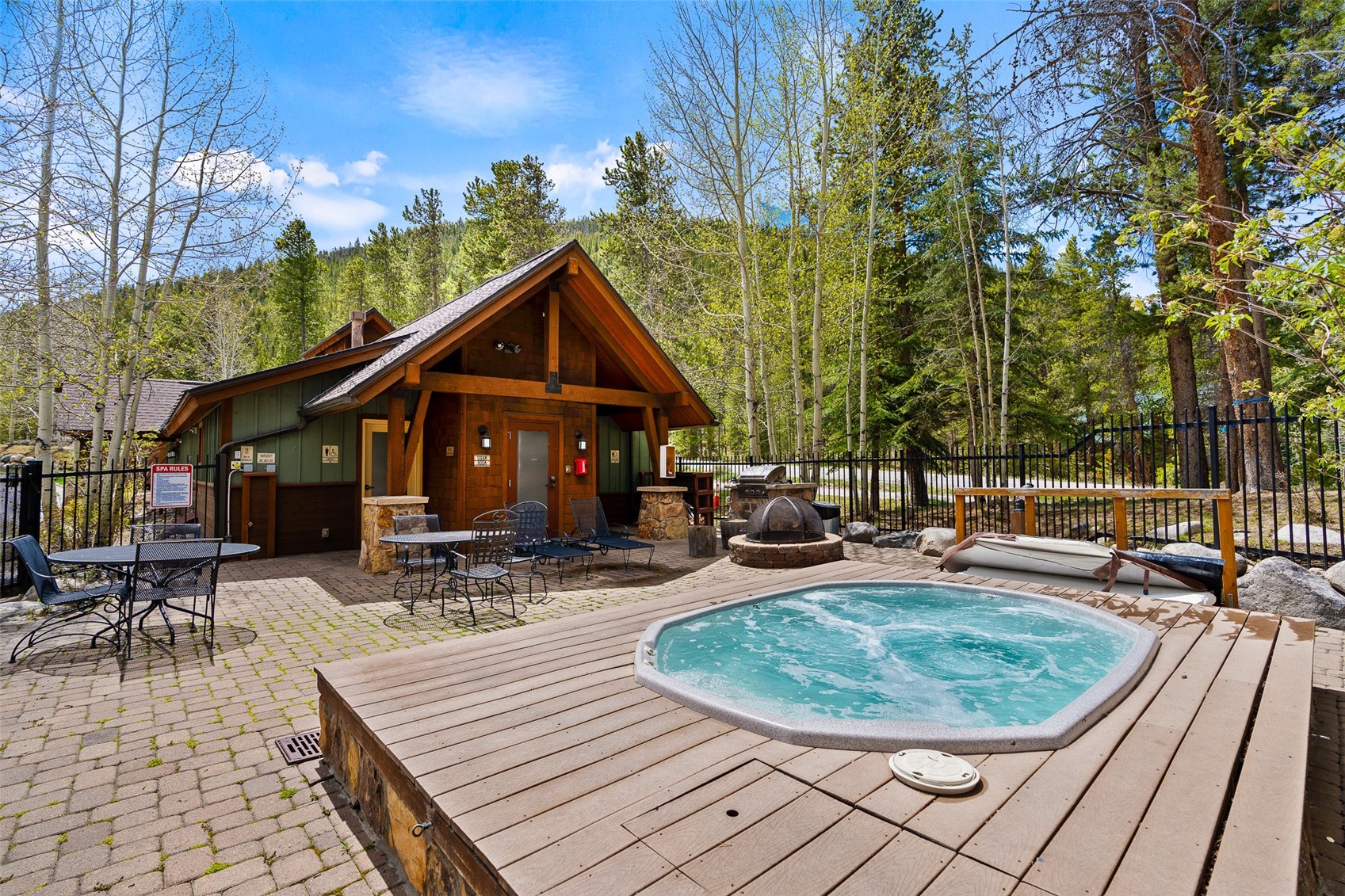 57 Lake Ridge Circle, Unit 1848 Keystone, CO 80435 - Photo 5 of 49 a view of a house with backyard sitting area